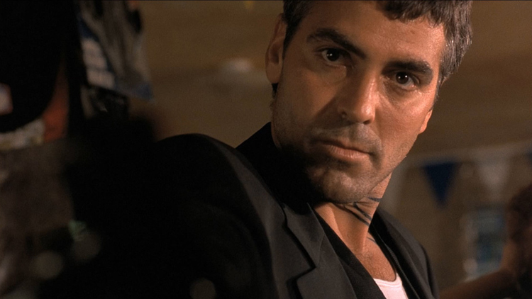 A still from the movie, From Dusk Till Dawn, featuring George Clooney as Seth Gecko