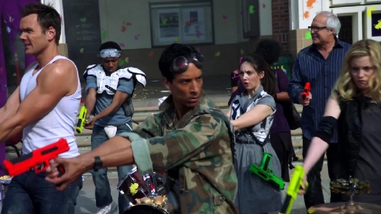 Screenshot from the series Community with the cast getting ready to play paintball
