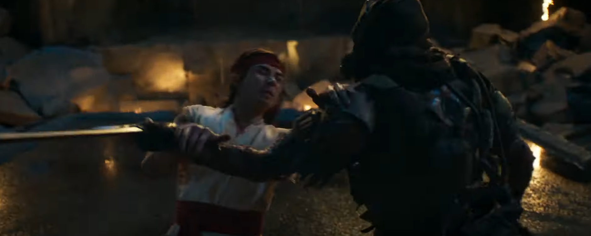 Mortal Kombat trailer screenshot: Liu Kang battles Kabal