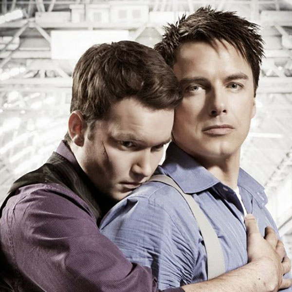 12 Couples In Geekdom: Ianto holding Jack from Torchwood.