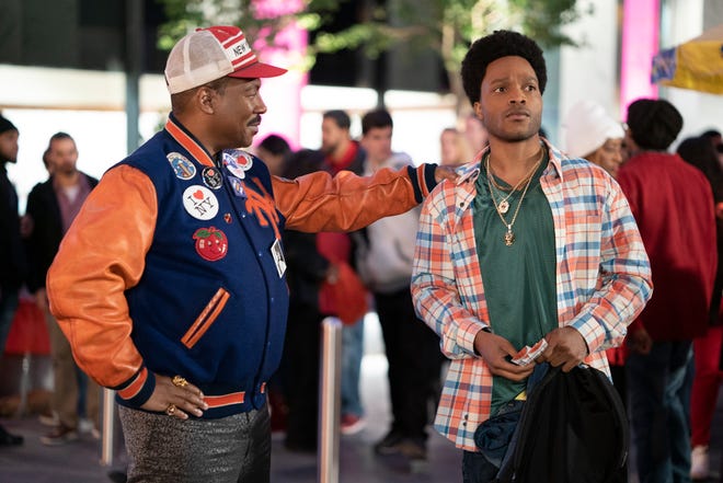 Akeem (Eddie Murphy) introduces himself to his long-lost son Lavelle (Jermaine Fowler).