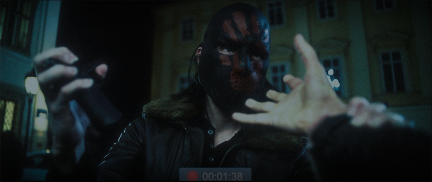 The leader of the anarchist group The Flag-Smashers attacks a friend of Sam's (Anthony Mackie) in a still from the Disney+ show "The Falcon and the Winter Soldier."