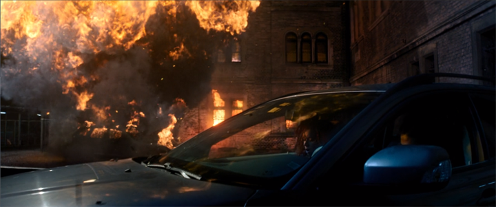 An explosion, caused by Karli Morganthau (Erin Kellyman) rocks a GRC supply depot in a still from the Disney+ show "The Falcon and the Winter Soldier."