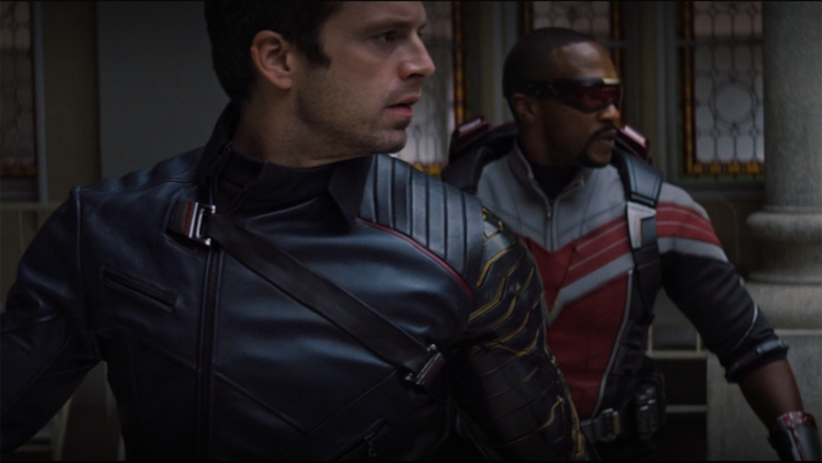 Sam (Anthony Mackie) and Bucky (Sebastian Stan) look on as Battlestar is killed in a still from 