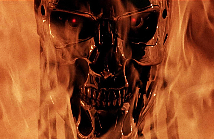 A shot of the endoskeleton skull of a T-800 surrounded by fire from the 1991 classic film 