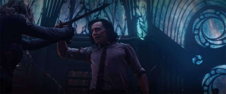Sylvie (Sophia Di Martino) fights Loki (Tom Hiddleston) to get to He Who Remains in a still from the Disney+ series "Loki."