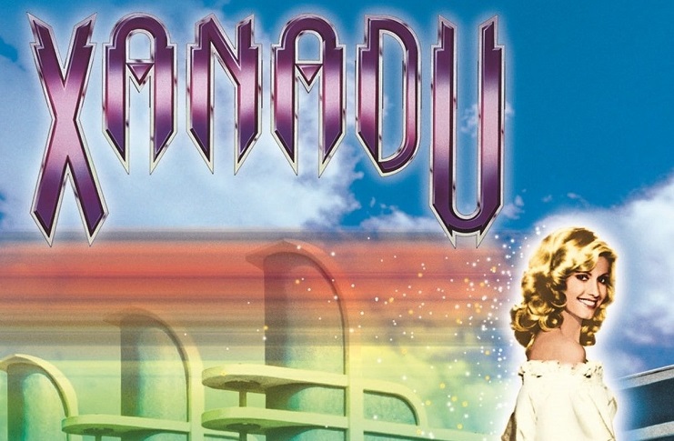 Slice of Xanadu movie poster with a smiling Olivia Newton-John on the lower right corner. 