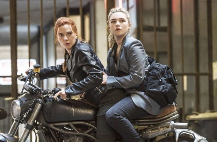 Scarlett Johansson and Florence Pugh in Black Widow on a motorcycle