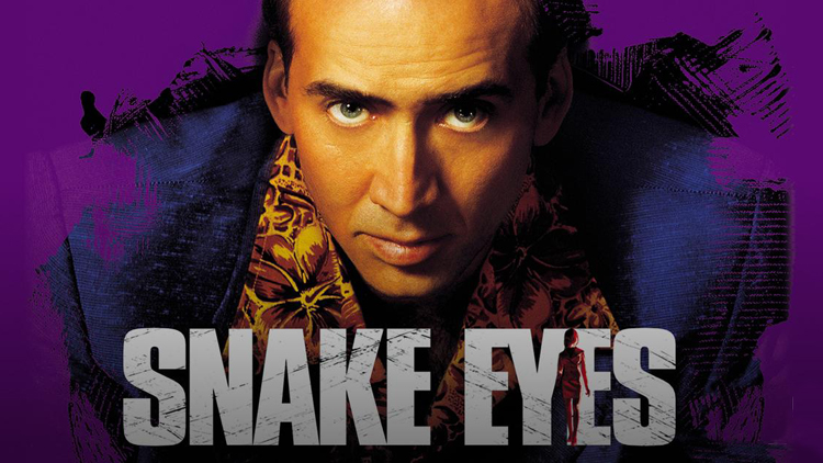 Nicolas Cage poses intently for the poster for the 1998 film "Snake Eyes."
