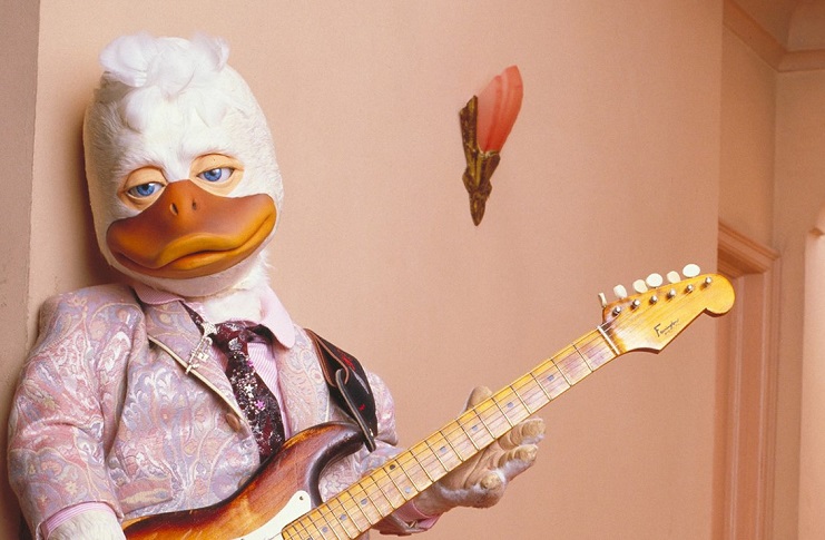 Howard the Duck holding guitar