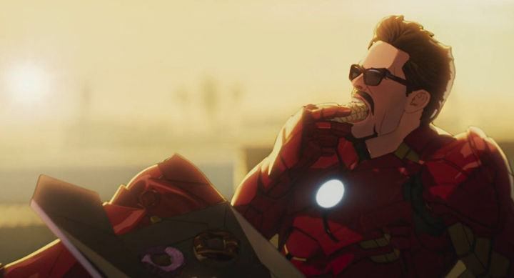 Tony Stark eats a donut while sitting in a donut in a still from the Disney+ series "What If...?"