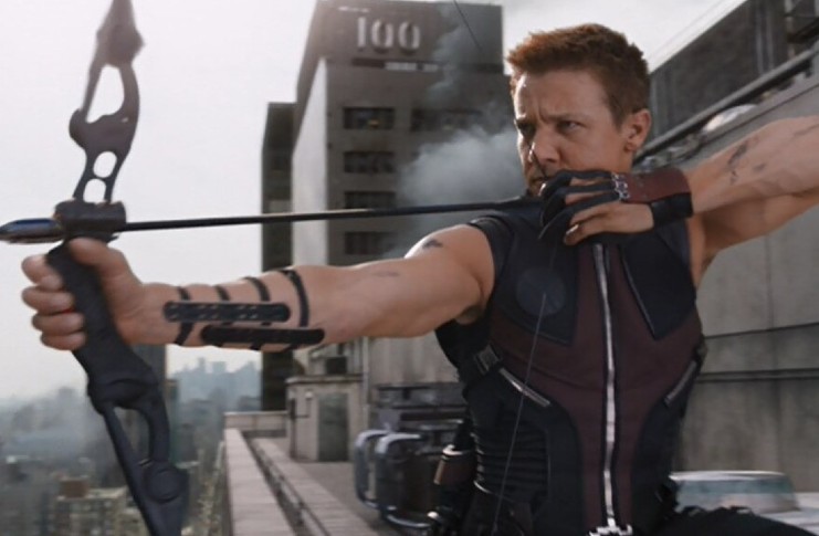 Jeremy Renner holding a bow and arrow as Hawkeye