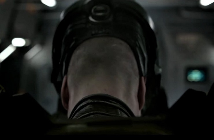 Pablo Schreiber putting on helmet in Halo