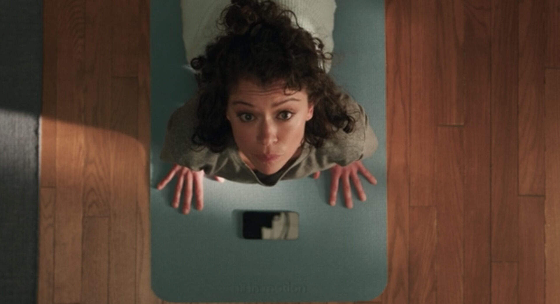 Jennifer Walters (Tatiana Maslany) stretches before her job as a New York City attorney in a still from She-Hulk clip