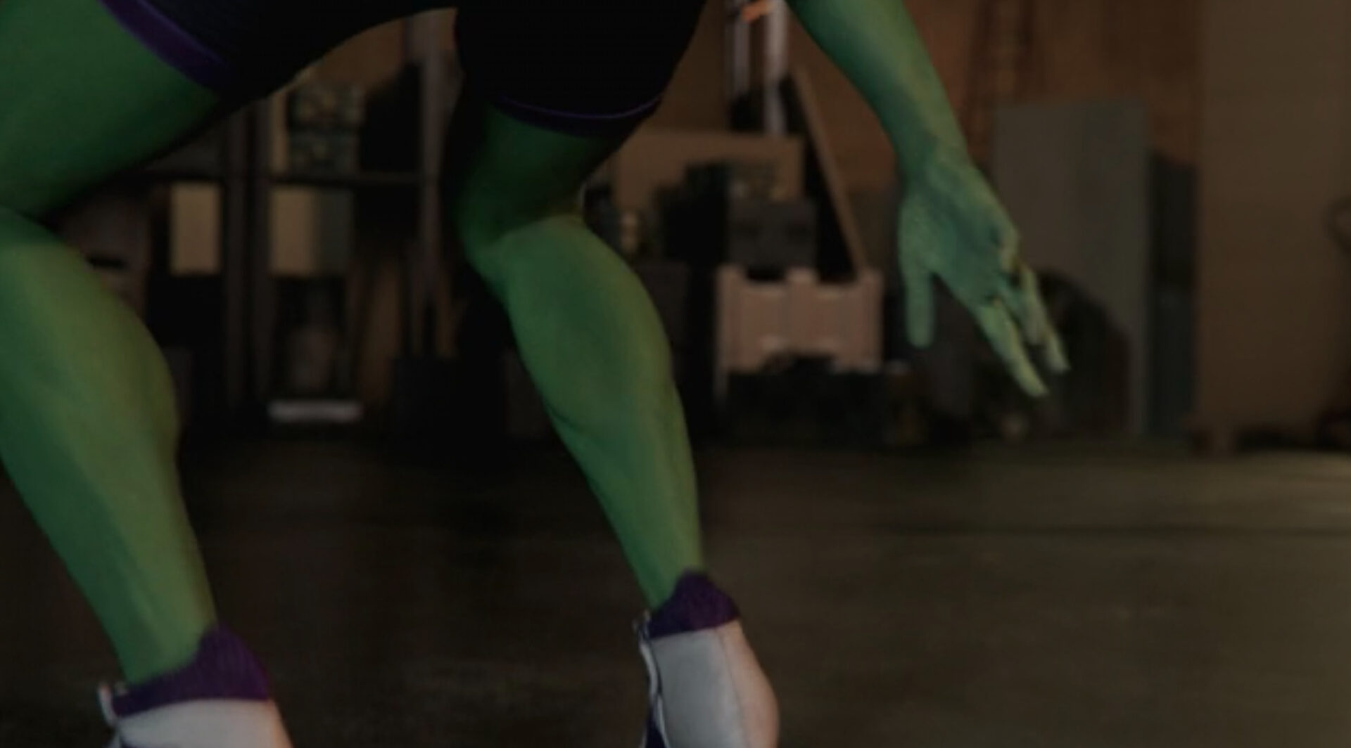 A peek at Jennifer Walter (Tatiana Maslany) and her green legs post transformation in a still from the Disney+ series "She-Hulk."