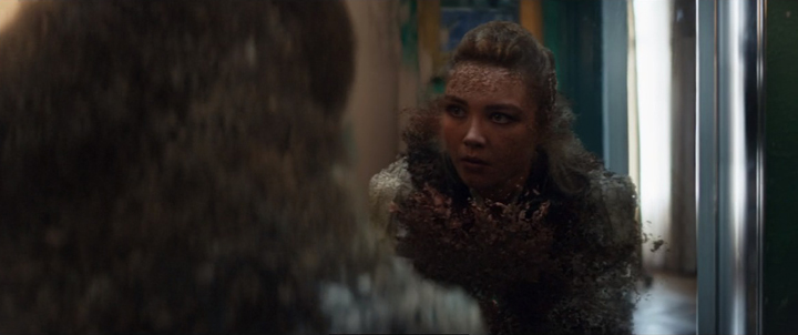 Yelena Belova (Florence Pugh) looks at herself in confusion as she returns from being dusted five years later in a still from the Disney+ series "Hawkeye."