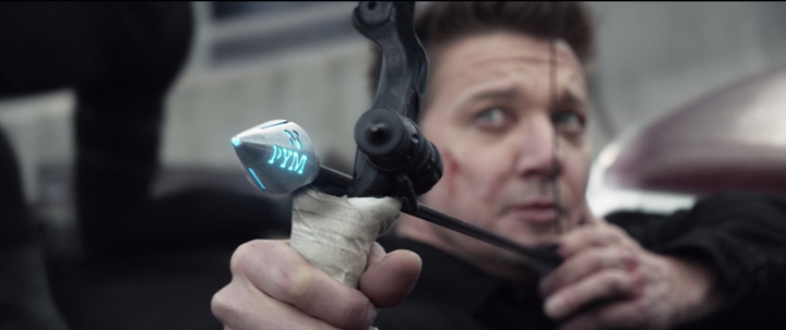 Clint Barton (Jeremy Renner) uses a Pym particle-powered arrow in a still from the Disney+ series "Hawkeye."