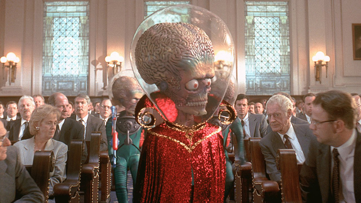 The alien overlord walks through the halls of Congress to meet with American delegates in a scene from the Tim Burton film "Mars Attacks!"