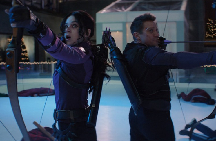 Kate Bishop (Hailee Steinfeld) and Clint Barton (Jeremy Renner) fight off the entirety of the Tracksuit mafia with trick arrows in a still from the Disney+ show 