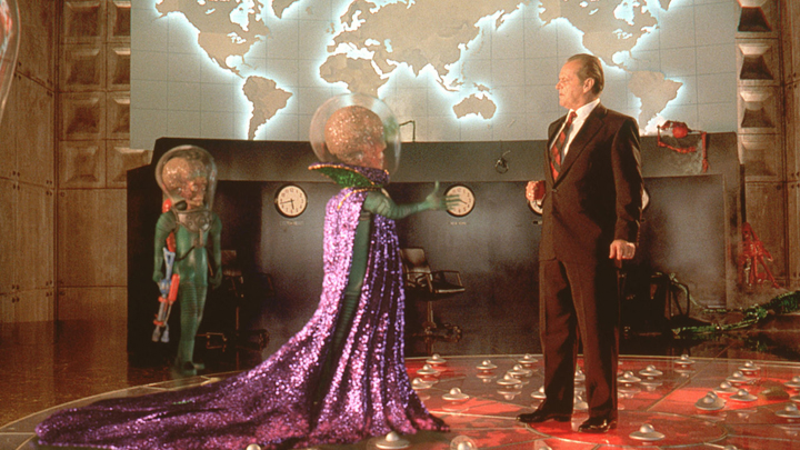 The alien overlord offers a handshake to the U.S. President (Jack Nicholson) in a scene from the Tim Burton film "Mars Attacks!"