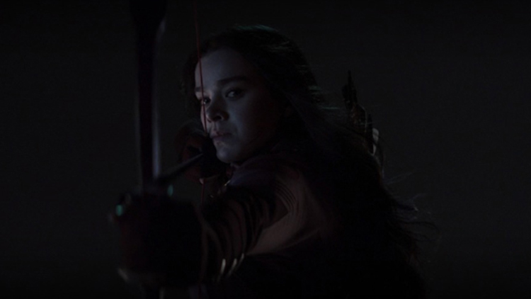 Kate Bishop (Hailee Steinfeld) readies her bow to help Clint Barton in a still from the Disney+ series "Hawkeye."