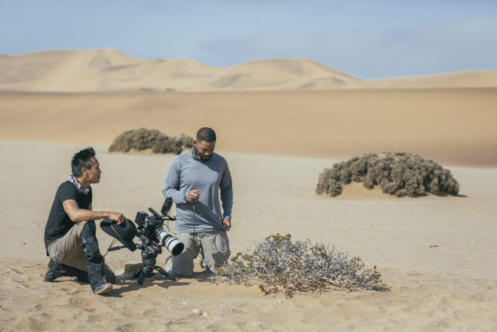 Will Smith and Explorer Albert Lin attempting to capture the feeding behavior of the Namaqua chameleon, using a slow motion phantom camera. (National Geographic/Freddie Claire)