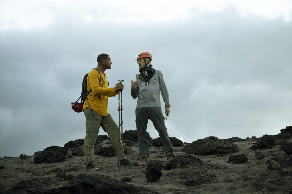  Will Smith, left, and Darren Aronofsky during production of Welcome to Earth where Will descends into a volcano to install sensors. (National Geographic for Disney+/Kyle Christy)
