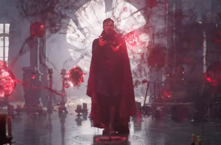 Benedict Cumberbatch as Doctor Strange standing in front of the window of the New York sanctum surrounded by red blobs 