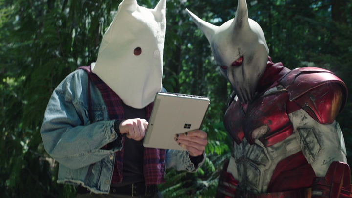White Dragon (Robert Patrick) uses a Microsoft Surface tablet to track Peacemaker a still from the HBOMax series "Peacemaker."