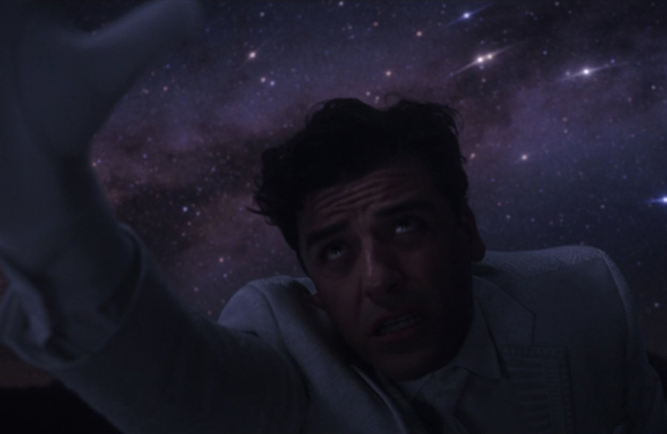 Steven Grant (Oscar Isaac) reaches out to Khonshu in a still from the Disney+ series 