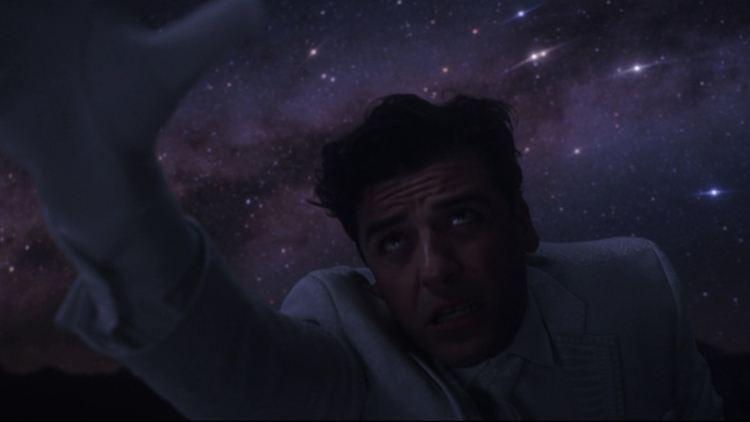 Steven Grant (Oscar Isaac) reaches out to Khonshu in a still from the Disney+ series "Moon Knight."