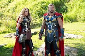 Natalie Portman as Jane Foster/The Mighty Thor and Chris Hemsworth as Thor in Thor: Love and Thunder