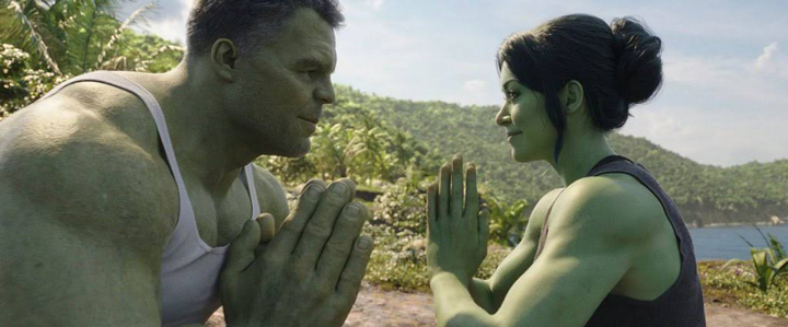 The Hulk tries to teach She-Hulk how to center herself through yoga in a still from the Disney+ show "She-Hulk."