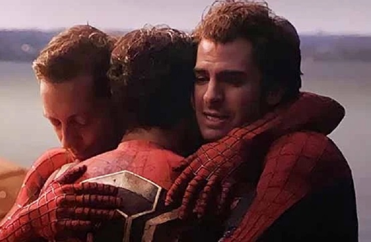 Tobey Maguire, Tom Holland and Andrew Garfield hugging in Spider-Man: No Way Home