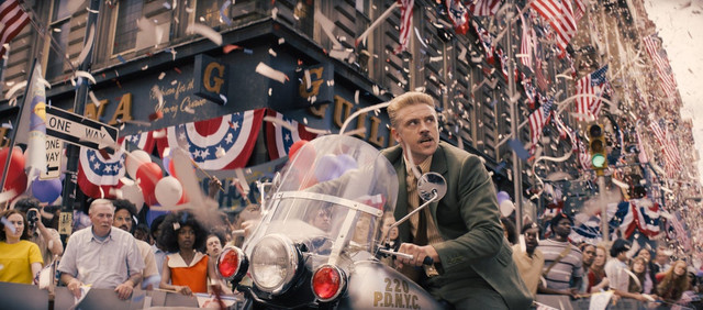 Boyd Holbrook as Klabber on a motorcycle during a parade in Indiana Jones 5