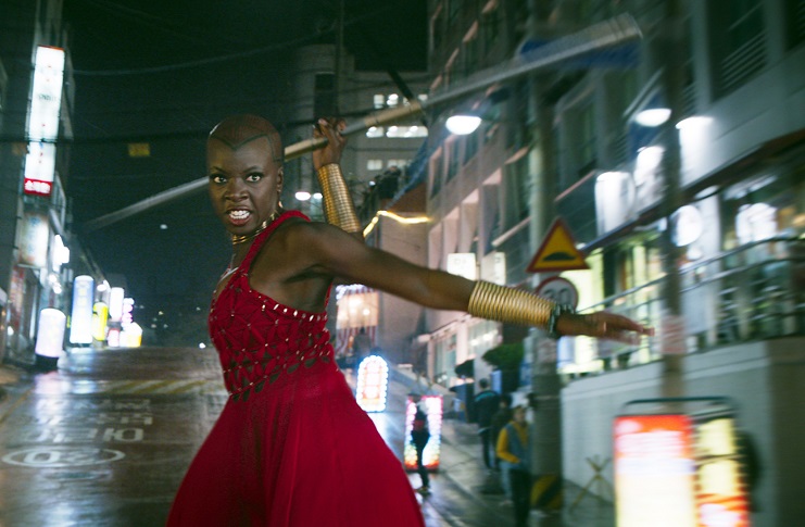Danai Gurira as Okoye in Black Panter, holding a spear