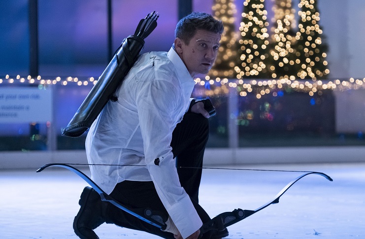 Jeremy Renner crouching with a bow in Hawkeye
