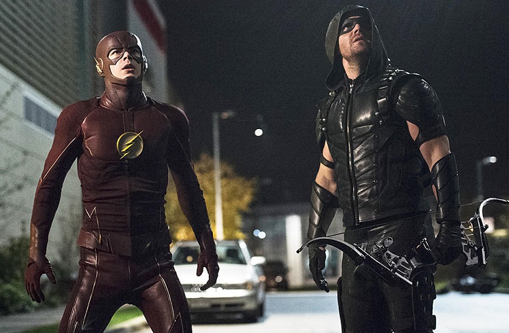 Grant Gustin as The Flash and Stephen Amell as Green Arrow