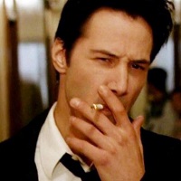 Keanu Reeves as John Constantine smoking